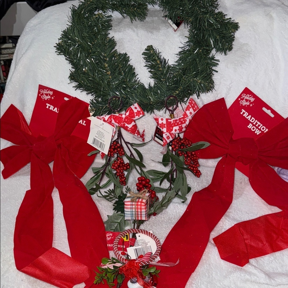 Festive Green Wreath with Red Bows and Berries